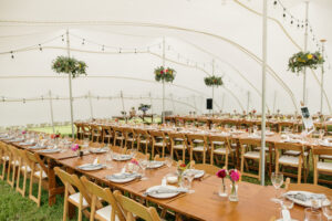 Stretch Tent Marquee set up for wedding with table & chair hire, flowers, dinnerware