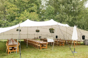Stretch Tent beautifully set up for outdoor wedding, event, party.