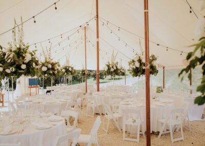 White on White wedding design within a white marquee